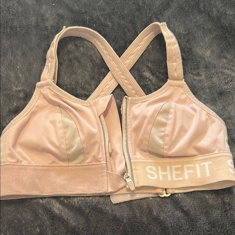 SHEFIT Cream Sports Bra with Front Zipper and X-Back Design